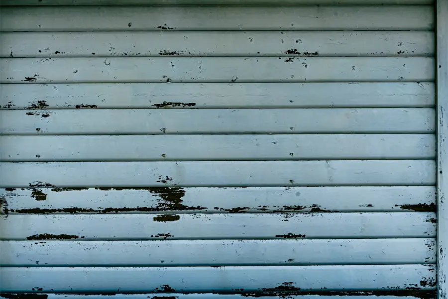 signs you need garage door panel repair in Tujunga, CA 